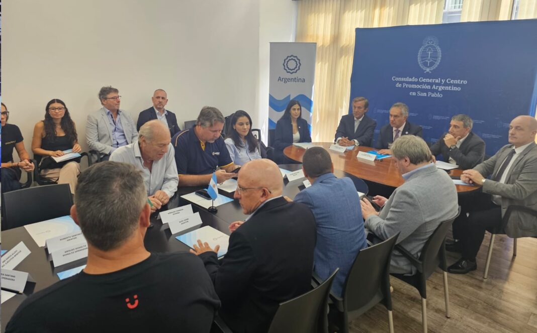 Scioli con operadores San Pablo 2026